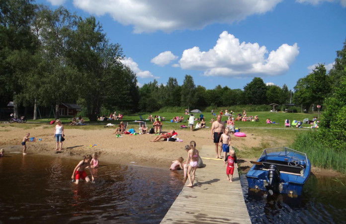 Värnamo in Småland: the bathing place Hjortsjöbadet on Lake Helgasjön in Rydaholm, near the Riksväg 27 national road
